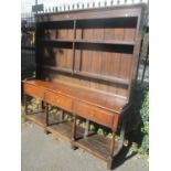 A George III oak dresser with a later adapted top, 190" h x 181"w