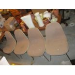 A set of four vintage Herman Miller fibre glass chairs with chrome legs, A/F