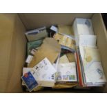 A large quantity of stamps, some in albums, other unmounted to include 1950's and later First Day