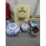 Commemorative collectables to include Royal Doulton beaker and jug, a Wedgwood blue Jasper three