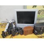 Two binoculars, Solent 10x 50 and Kershaw 6 x 30, a crown television and a digibox