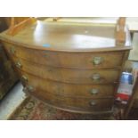 A Georgian mahogany bow fronted chest of four graduated drawers on ogee feet 32 1/2"h x 41 1/2"w