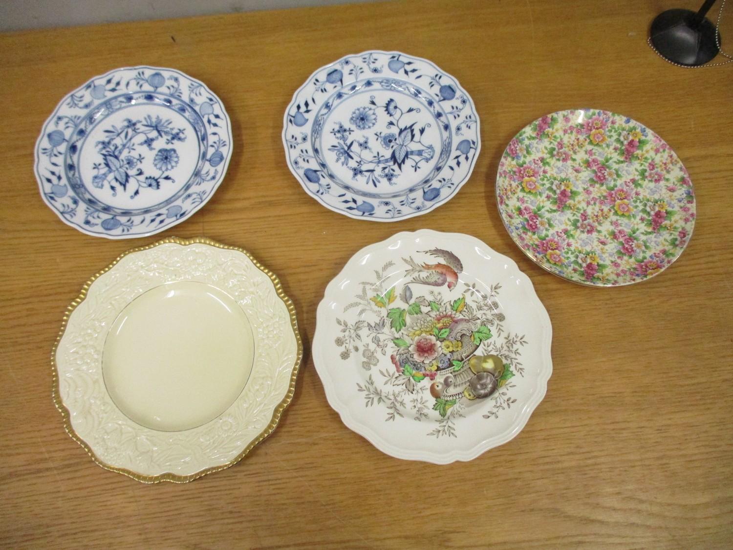 A pair of Meissen Onion pattern plates, 19th century, a Royal Doulton plate and two other plates