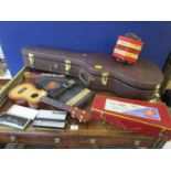 A selection of musical instruments to include a boxed Balalaika stylophone, zither, Heco harmonica
