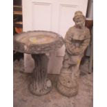 A constituted stone garden statue together with a bird bath, 24" h