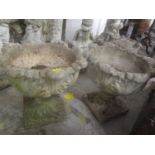 A pair of reconstituted stone garden planters, raised on square bases, 171 2/2"h