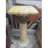 An onyx square topped stand having a circular column and a gilt metal rim, 29 1/2"h x 12"w