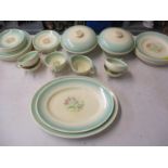 A Susie Cooper Green Dresden pattern dinner service