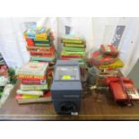 A quantity of boxed vintage jigsaw puzzles, an Anna Scop, retro red push button telephone and