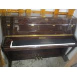 A Bentley mahogany upright piano, 43 1/2"h x 55 1/2"w