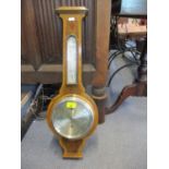 A 20th century Harrods Ltd walnut framed banjo wall barometer