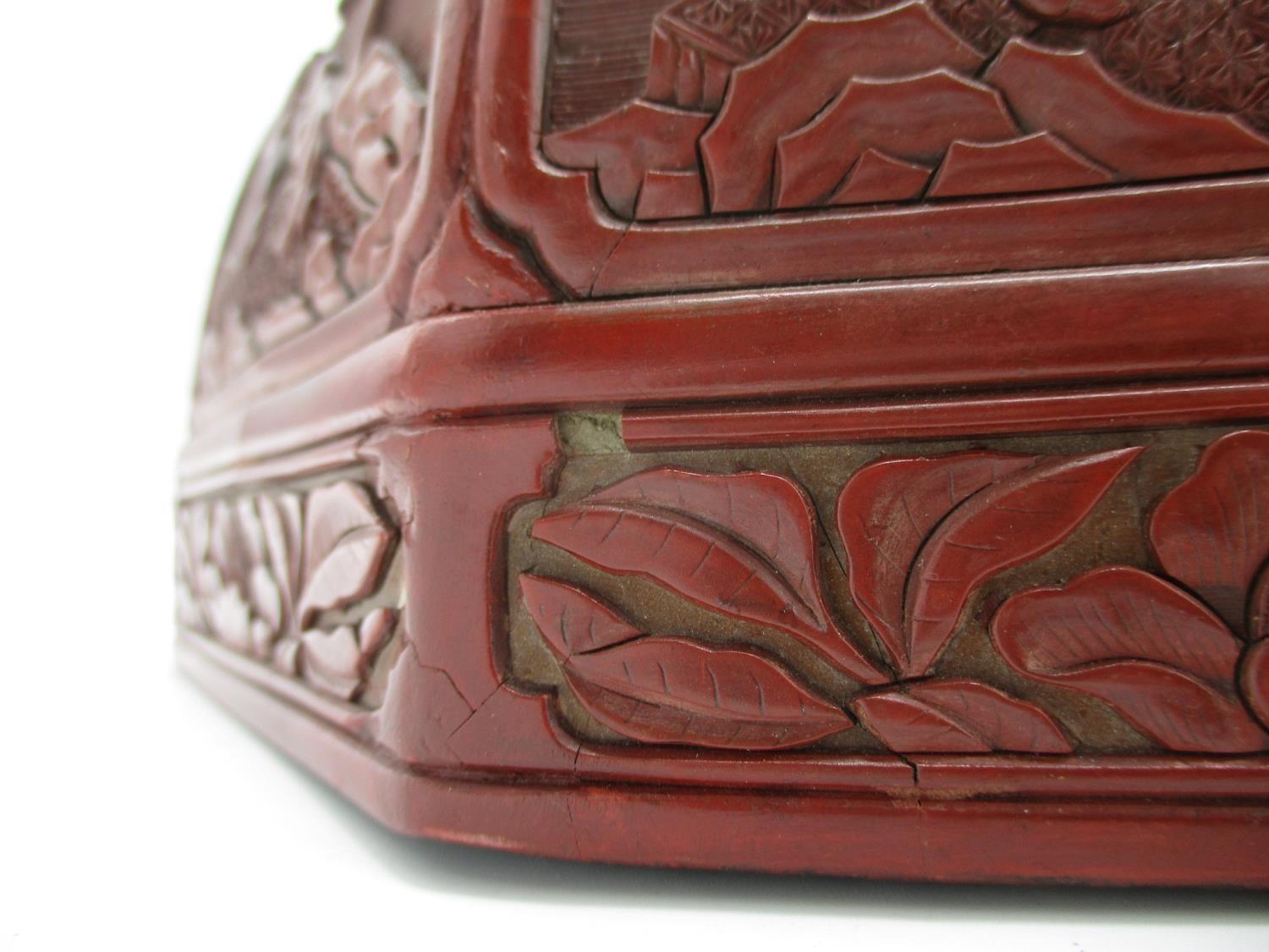 A large 19th century Chinese cinnabar box of octagonal form, the domed lid decorated with panels - Image 14 of 17