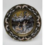 An 18th/19th century French enamel plate decorated to the centre with an allegorical scene and