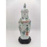 A Chinese famille vert porcelain lidded vase, 18th century, the hexagonal body applied with