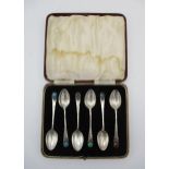 A set of six 1930s silver teaspoons by Langstone Silver Works, Birmingham with spot hammered