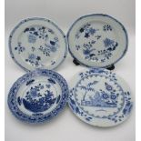 Three late 18th century Chinese plates and a dish comprising of a pair decorated with flowers and