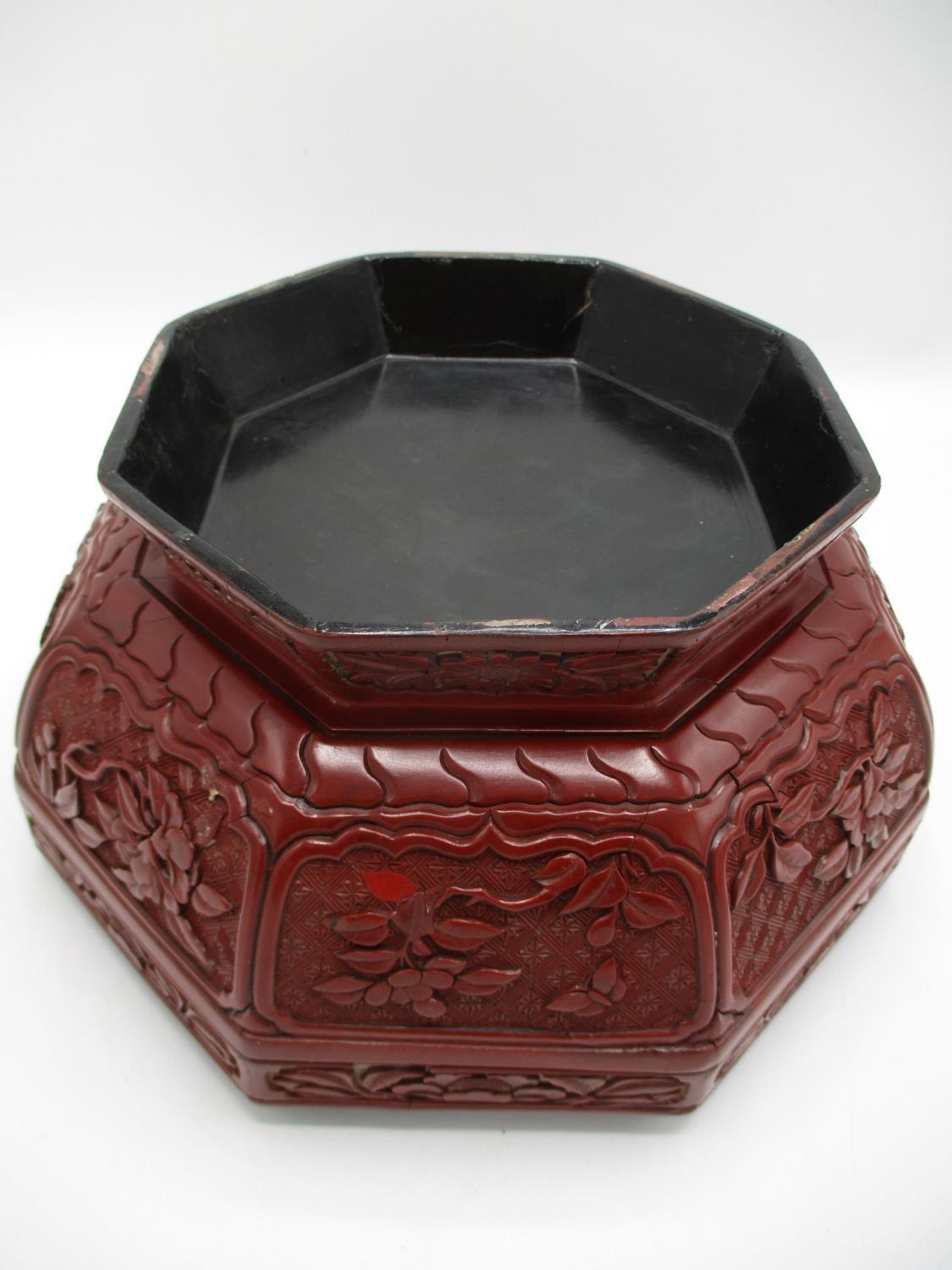 A large 19th century Chinese cinnabar box of octagonal form, the domed lid decorated with panels - Image 8 of 17