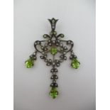 An Edwardian style chandelier design pendant, set with periods, diamonds an seed pearls