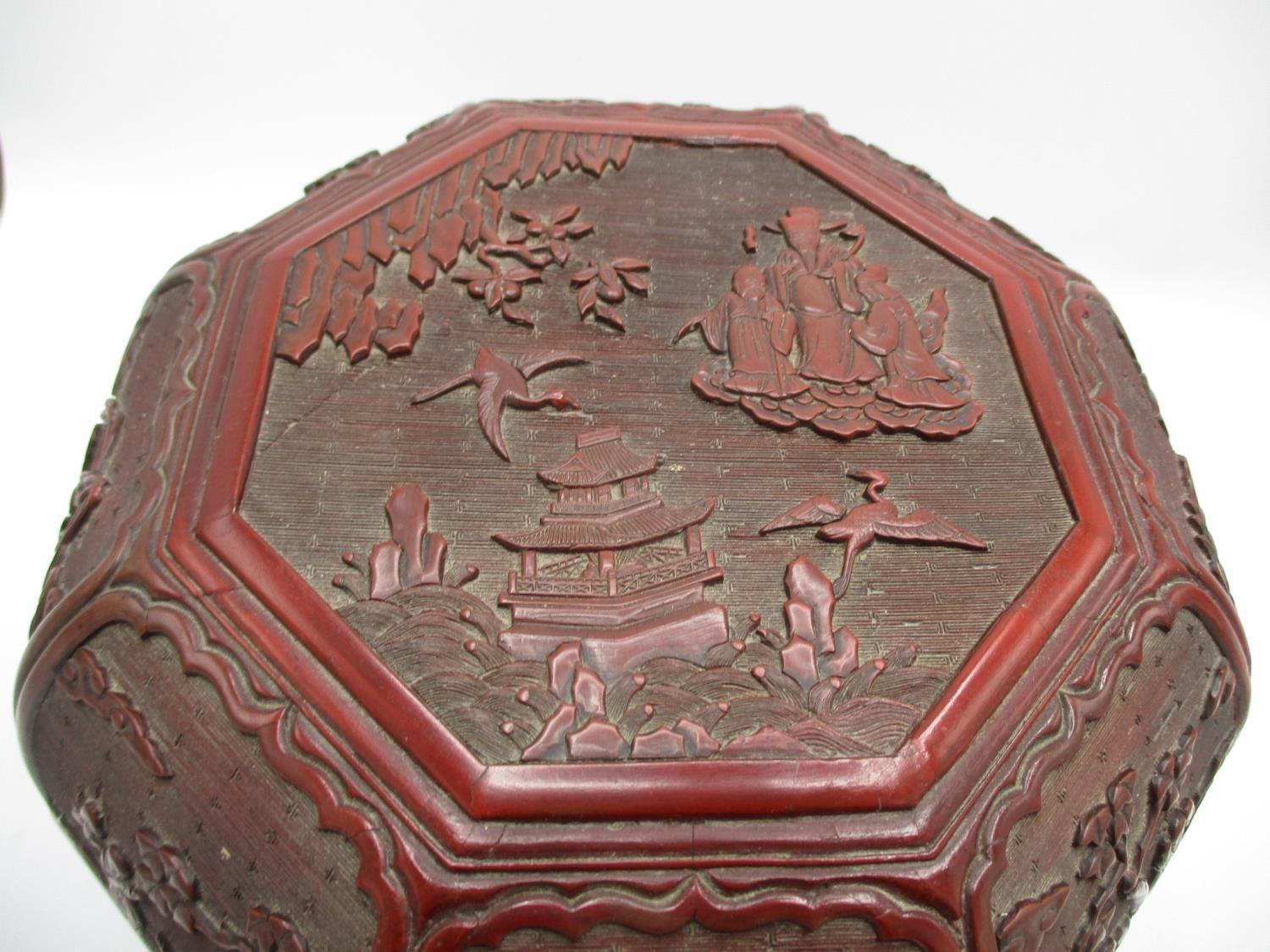 A large 19th century Chinese cinnabar box of octagonal form, the domed lid decorated with panels - Image 4 of 17