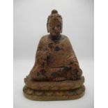 A 19th century Chinese carved stone figure Guanyin on a lotus leaf base