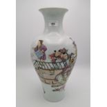 A Chinese 20th century porcelain baluster vase, decorated with polychrome enamels depicting children