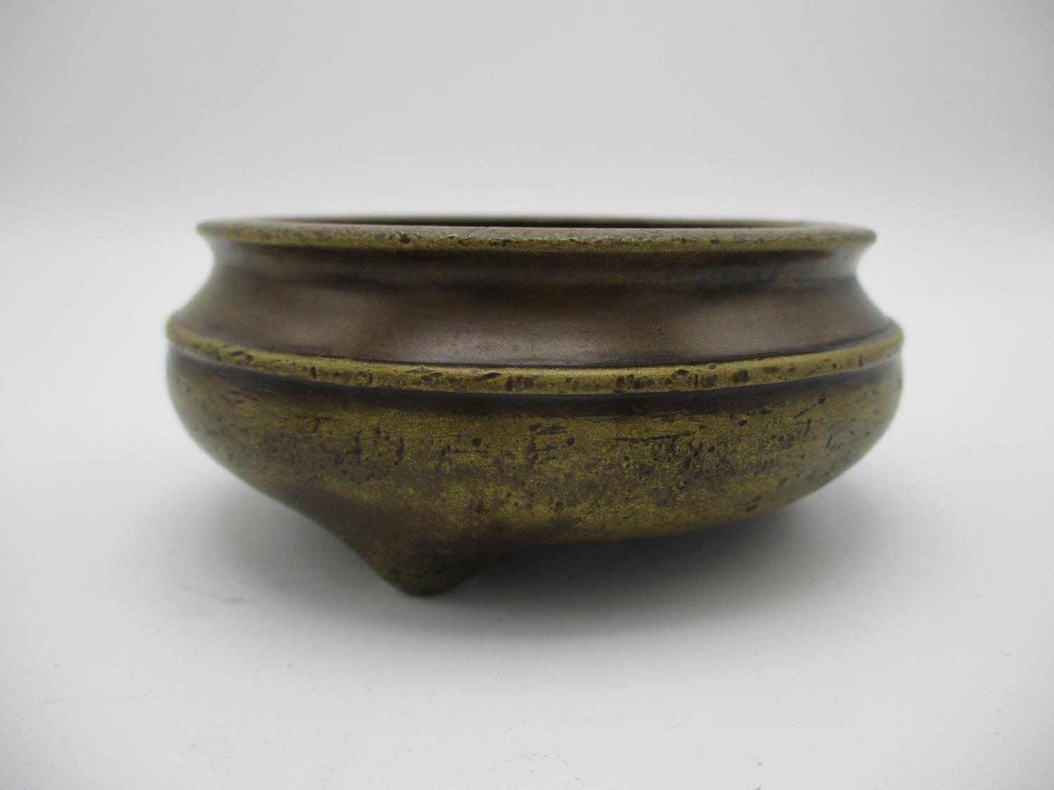 A 20th century Chinese bronze censer having a carved and pierced wooden lid with a carved jade - Image 3 of 7