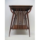 An Arts & Crafts, possibly Scottish walnut occasional table with a shaped top, over spindle and ball