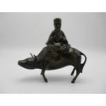 A 19th century Chinese bronze incense burner, fashioned as a Tao Philosopher Lazo riding a water