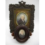 Two 18th century portrait miniatures, each of a man wearing a wig, a white shirt and a black jacket,