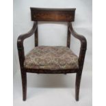 An 18th century Dutch walnut and marquetry carver chair with a tablet crest and curved arms,