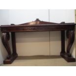 A William IV mahogany serving table with a carved upstand, gadrooned edge and frieze drawer, on