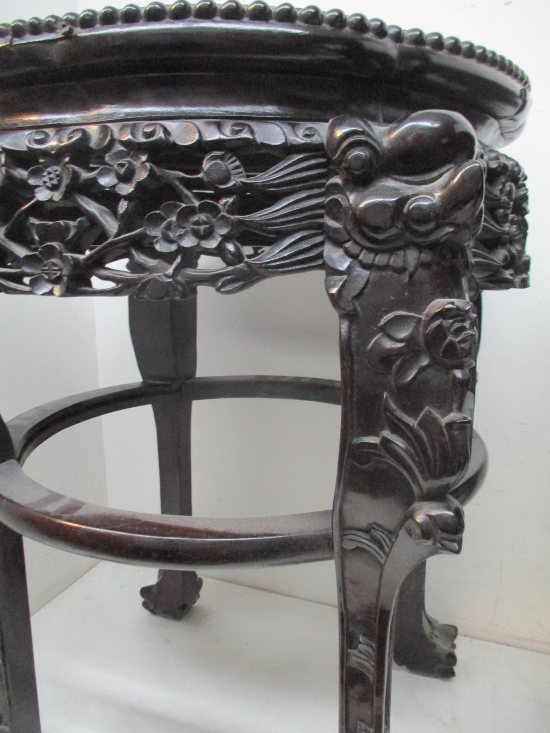 A pair of late 19th century Chinese carved hardwood tables with an inset marble, lobed top, a - Image 2 of 5