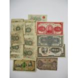 One hundred and eighteen 10 yen Chinese banknotes, along with a one yvan, a 500 yuan, a 100 yuan,