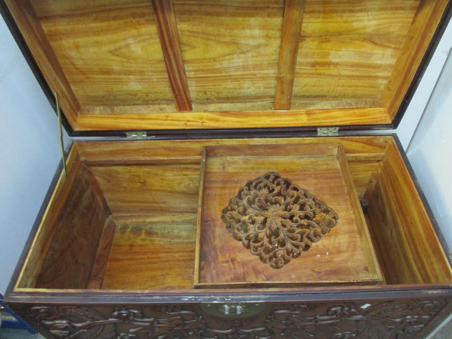 An early 20th century Chinese hardwood chest, the top, front and sides carved with dragons and - Image 4 of 6