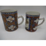 Two similar late 18th century Chinese Qing Dynasty export tankards, decorated with a panel of
