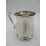 A George II silver tankard by Robert Collier, London 1748, with bell shaped body, scrolled handle