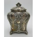 A Victorian silver tea caddy by Thomas Bradbury & Sons, London 1894, of bombe form with repousse