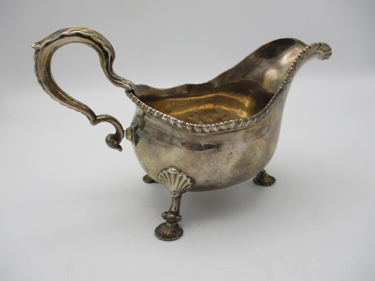 A George II silver sauce boat by Daniel Smith & Robert Sharp, London 1759, modelled with a gadrooned - Image 4 of 5