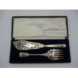 A cased near pair of Victorian fish servers, by Mappin Brothers and Henry John Lias & James