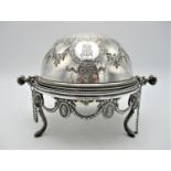 A Victorian silver muffin style dish by S Smith & Son, London 1876, the retractable lid engraved