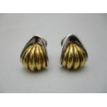 A pair of 18ct white and yellow gold earrings of shell design, 10.2grams in an Asprey retail case