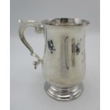 A George III silver tankard by William Stephenson, London 1793, with baluster body and c scroll