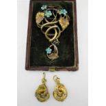 Victorian yellow metal coloured jewellery comprising of a pendant, brooch fashioned as a flowering
