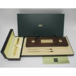 A Dunhill Gemline Classic gilt fountain pen with 14ct gold nib in Dunhill box, together with a Cross