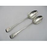 A pair of George III silver serving spoons by William Eaton, in the fiddle pattern, 30.5 cm long,