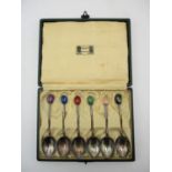 A cased set of six George V silver teaspoons by Liberty & co, Birmingham 1926, each with hardstone