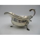 An Elizabeth II silver sauce boat by C.J Vander, London 1971, with gadrooned border and acanthus