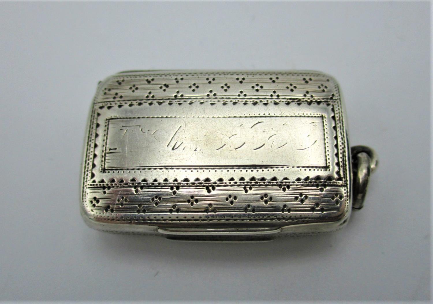 A George III silver vinaigrette by Joseph Willmore, Birmingham 1813 of cushion form with engraved