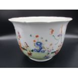 A 20th century Chinese porcelain jardiniere, with polychrome enamels depicting children playing in a