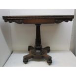 A William IV period rosewood card table, with moulded frieze and apron, the top with chamfered